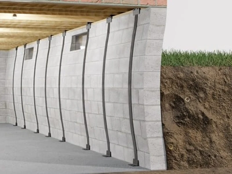 Bowing foundation wall with carbon fiber strap repair installed in Grand Rapids MI basement